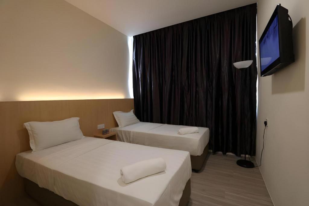 Place2Stay @ Campus Hub กูชิง ภายนอก รูปภาพ